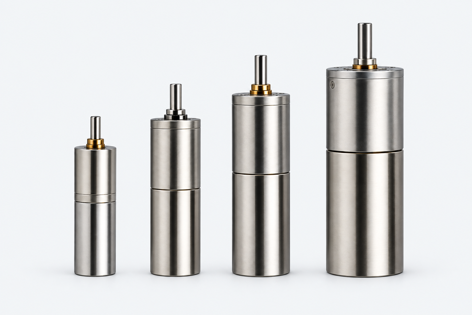 Four upright complete geared-drive assemblies ordered by size